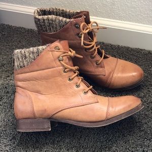 Tan brown ankle boots w/ knitting detail.
